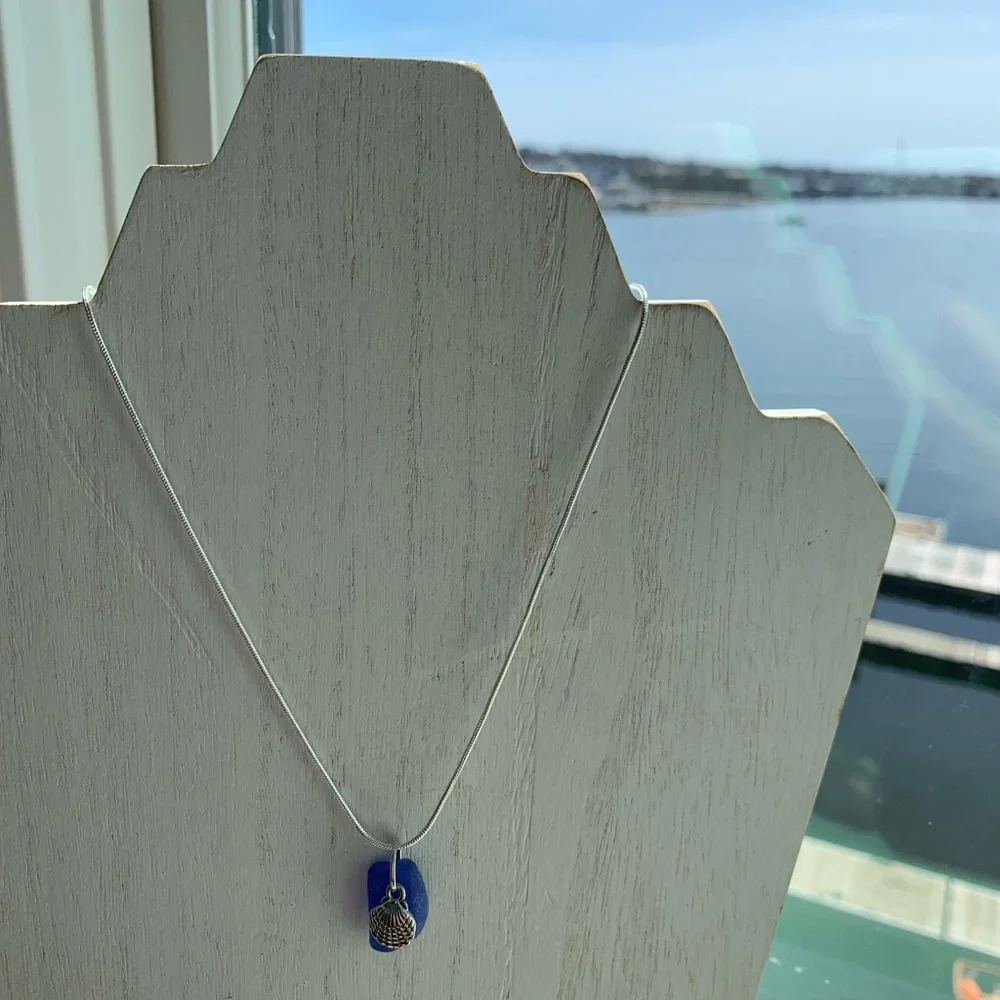 Real sea glass pendant, rare blue piece with sea shell charm